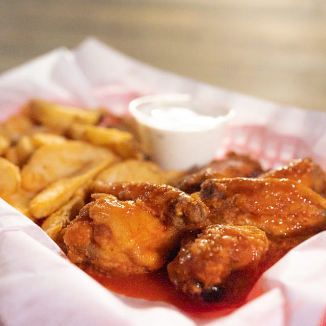 Hot Wings with French Fries.